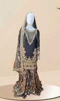 intricate hand-embroidery with shimmering gold details