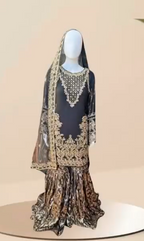 intricate hand-embroidery with shimmering gold details